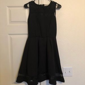 Black A-line cocktail dress.